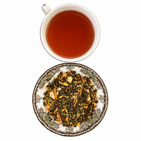 Orange Spice Cinnamon Decaf loose-leaf tea with brewed tea on a white background