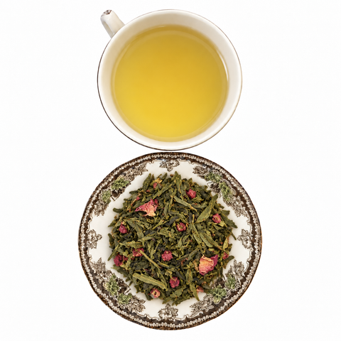 Raspberry Punch loose-leaf tea with brewed tea on a white background