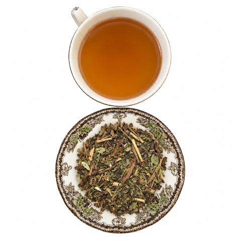 Roasted Mint loose-leaf tea with brewed tea on a white background