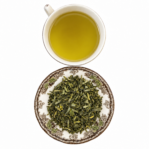 Sencha Green Tea, Organic loose-leaf tea with brewed tea on a white background