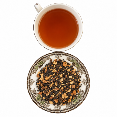 Spiced Apple Chai loose-leaf tea with brewed tea on a white background