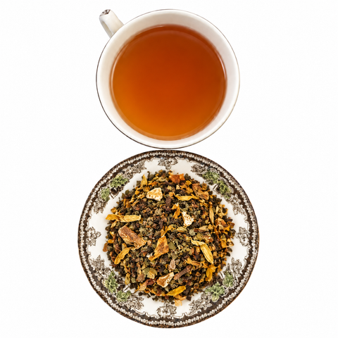 Spiceflower Grove loose-leaf tea with brewed tea on a white background