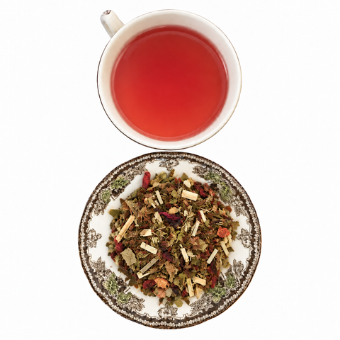 Summer Love Strawberry Basil loose-leaf tea with brewed tea on a white background