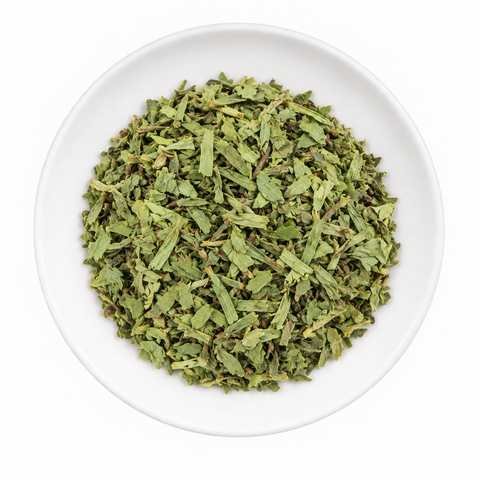 Tarragon dry product on a plain white plate against a white background