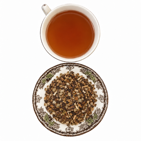 Toasted Mate loose-leaf tea with brewed tea on a white background