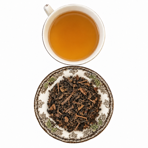 Vanilla Oolong loose-leaf tea with brewed tea on a white background