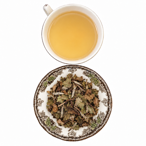 White Blueberry loose-leaf tea with brewed tea on a white background