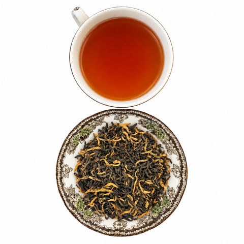 Yunnan loose-leaf tea with brewed tea on a white background