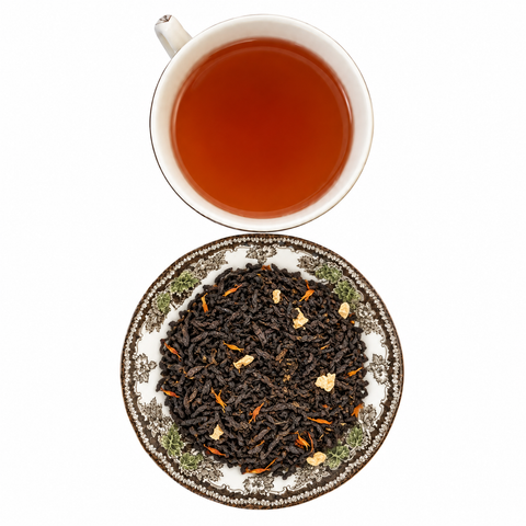 Zesty Cherry loose-leaf tea with brewed tea on a white background